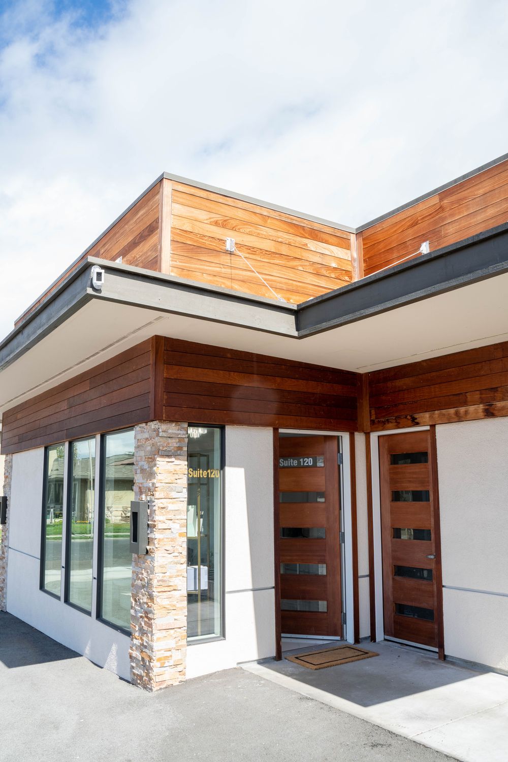 Modern building exterior with wood accents.