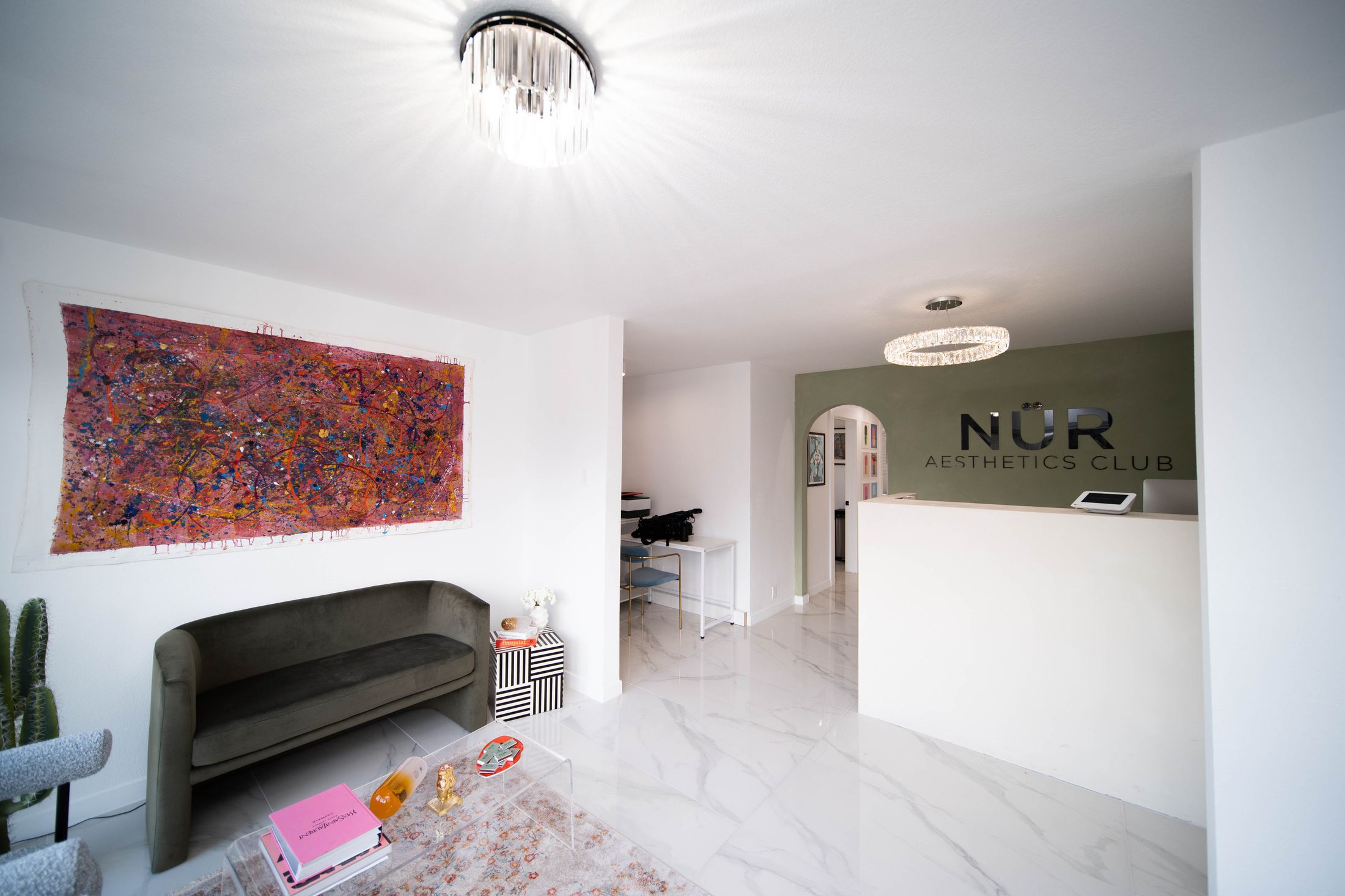 Stylish aesthetics club reception area interior design.